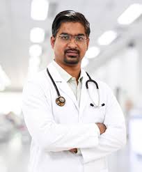 Dr Dinesh Sharma